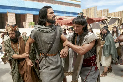 Alma the Younger is seized by lawyers in the city of Ammonihah.