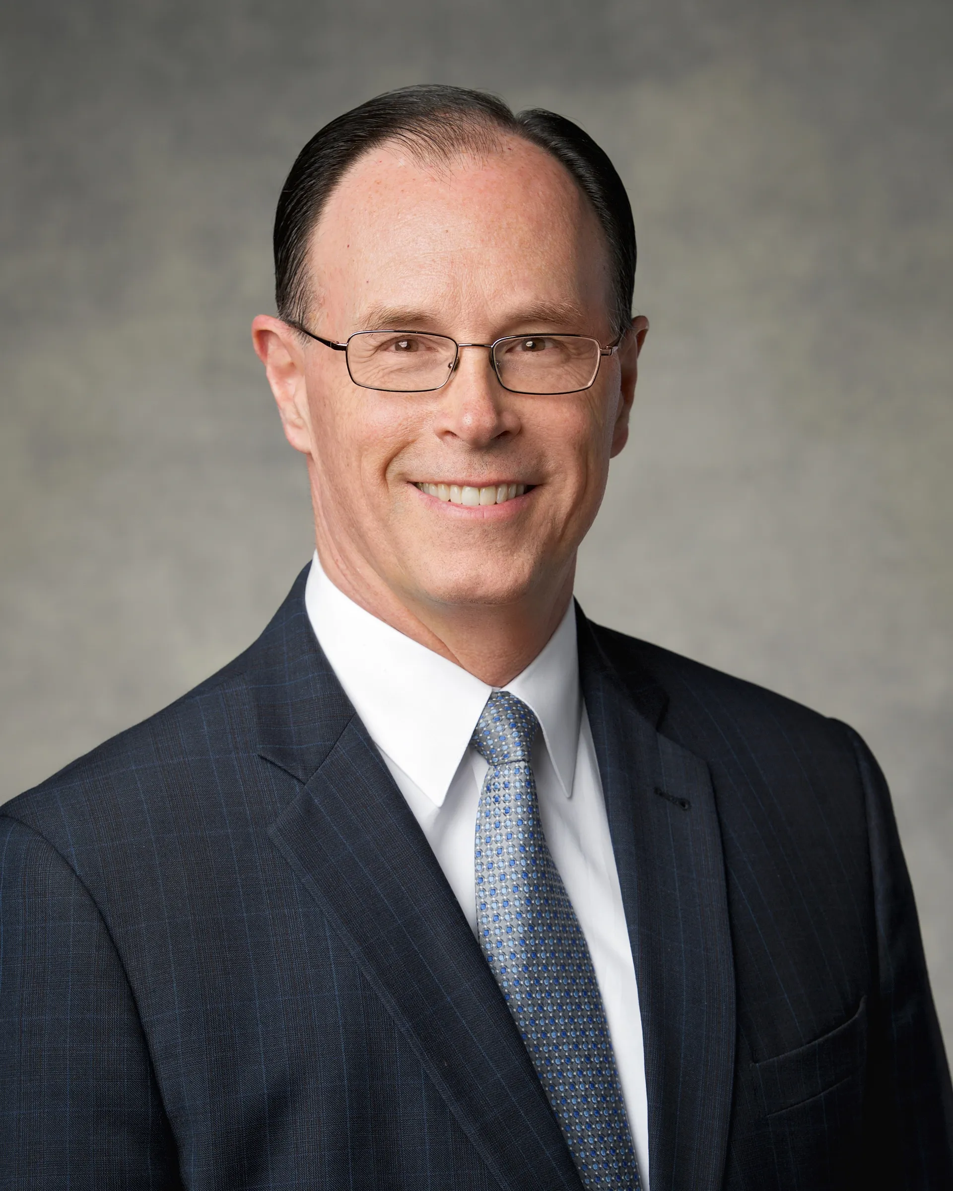 A formal portrait of W. Christopher Waddell.