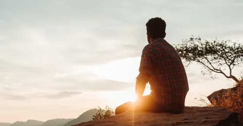 young man looking to horizon