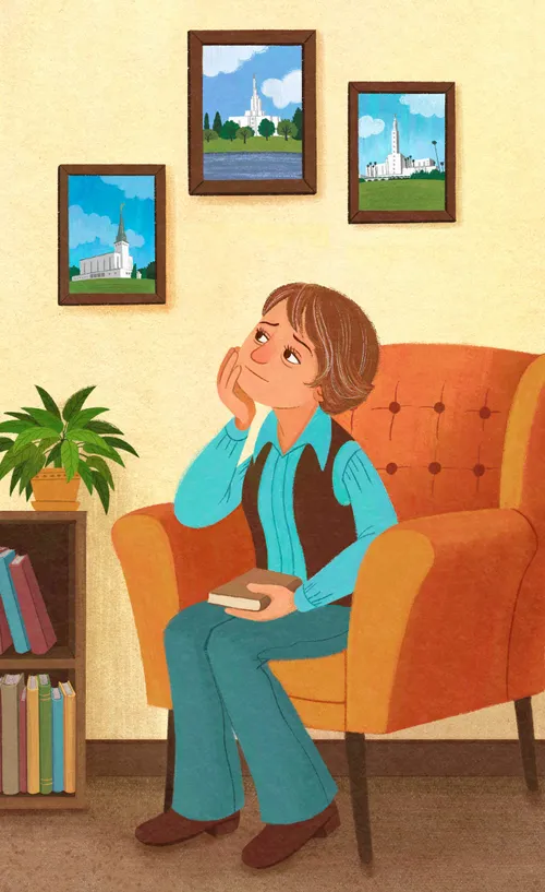 woman sitting on chair looking at temple pictures