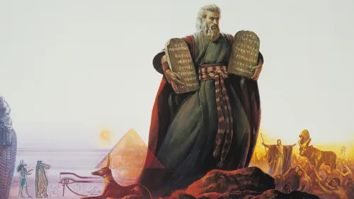 Moses holding a stone tablet in each arm
