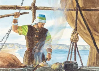 man with fire and tools