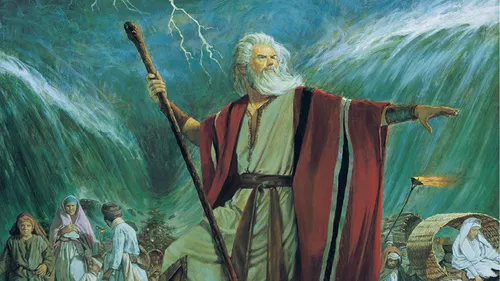 Moses holding a staff and parting the Red Sea