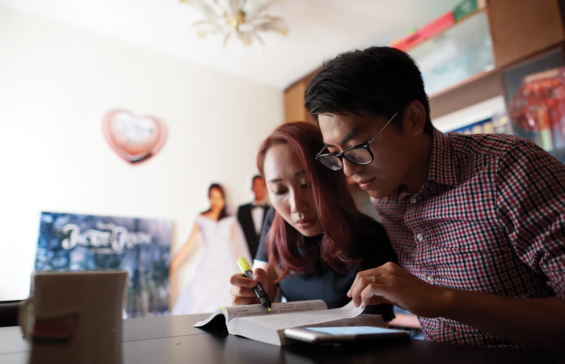 Despite their busy schedules, Jason and Jackie make sure they take time in the evenings to read the scriptures together.