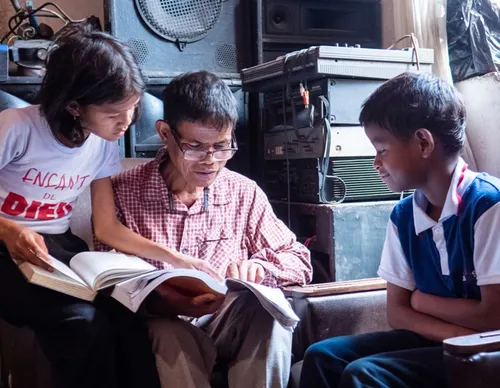 Lauren and family studying the scriptures