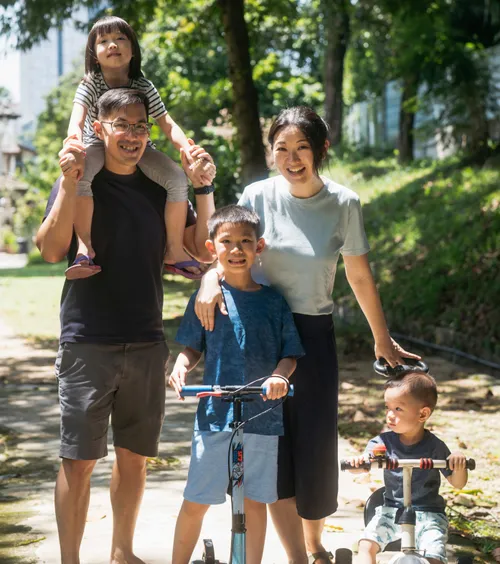 Boy with parents and two younger siblings
