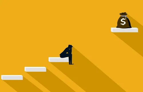 an illustrated figure sitting on a step and looking dejectedly at a pile of money that is out of reach