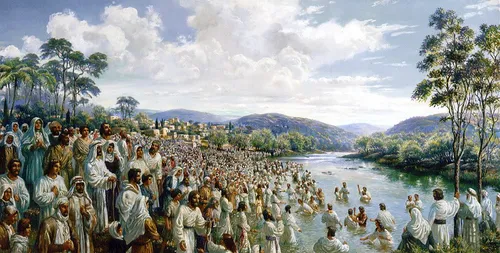 crowd at baptism in river