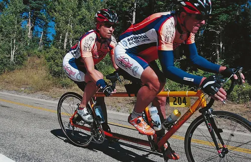 Couple on tandem bicycle