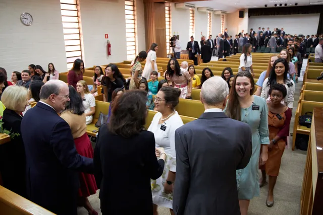 President Russell M. Nelson and his wife Wendy Watson Nelson, and Quentin L. Cook greet Missionaries