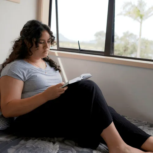 young woman reading scriptures