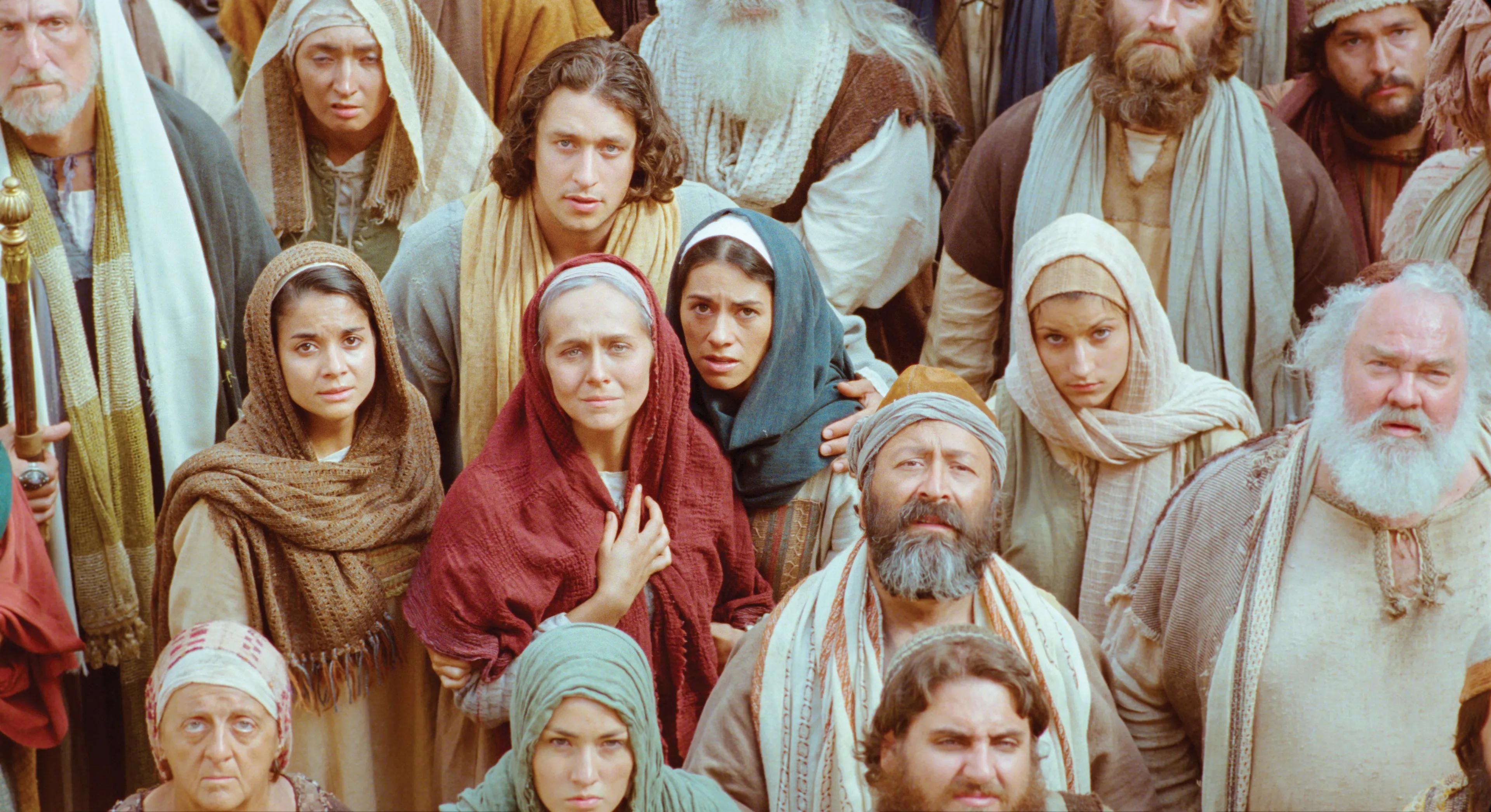 Mary stands in the crowd as Jews condemn Christ.
