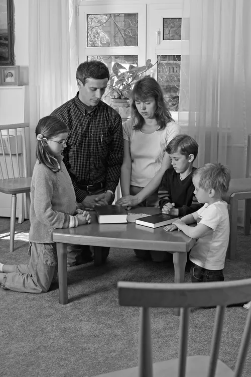 family praying