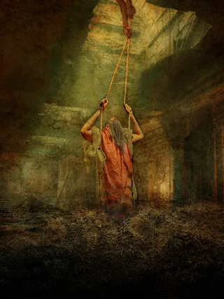 Jeremiah being lifted out of a dungeon with ropes
