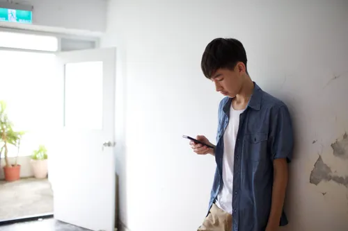 young man using smartphone