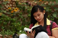 youth studying scriptures