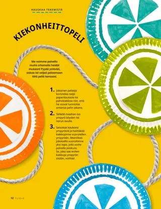 Värillisiä paperilautasia ja köyttä