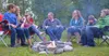 family around campfire
