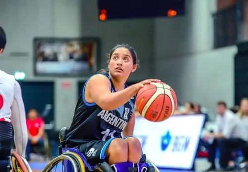Julieta playing basketball