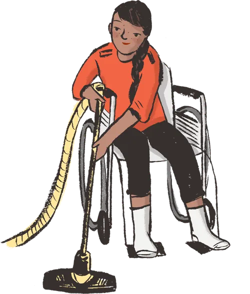 girl in wheelchair vacuuming