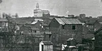 Image of Nauvoo and Nauvoo Temple from a daguerreotype, copy of photo,1846.  This image is a mirror image of PH 1300it135.tif.  From the Charles William Carter glass negative collection which contains portraits of prominent individuals and other Salt Lake City and Utah residents; photographs of activities, buildings, and homes in Salt Lake City; and photographs of Temple Square, Great Salt Lake and its resorts, Fort Douglas, several Utah communities, and railroads. Also includes portraits of Chinese and Indians and photographs of drawings, paintings, lithographs, cartoons, and photographs taken by photographers other than Carter.  Interior views of Salt Lake Temple, formerly numbered 901-904 in this collection, have been determined to be C.R. Savage Co. views and are now part of PH 600. Items 905-934 have not been renumbered.