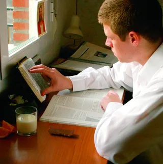 elder missionary studying