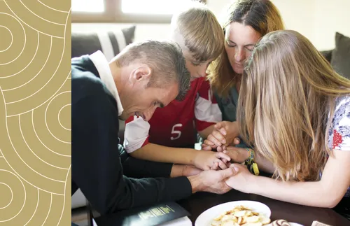 family praying