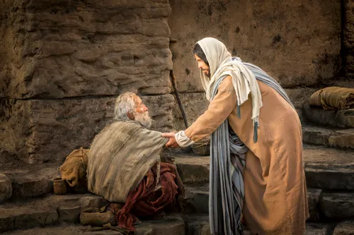 a man being healed by Christ at the pool of Bethesda