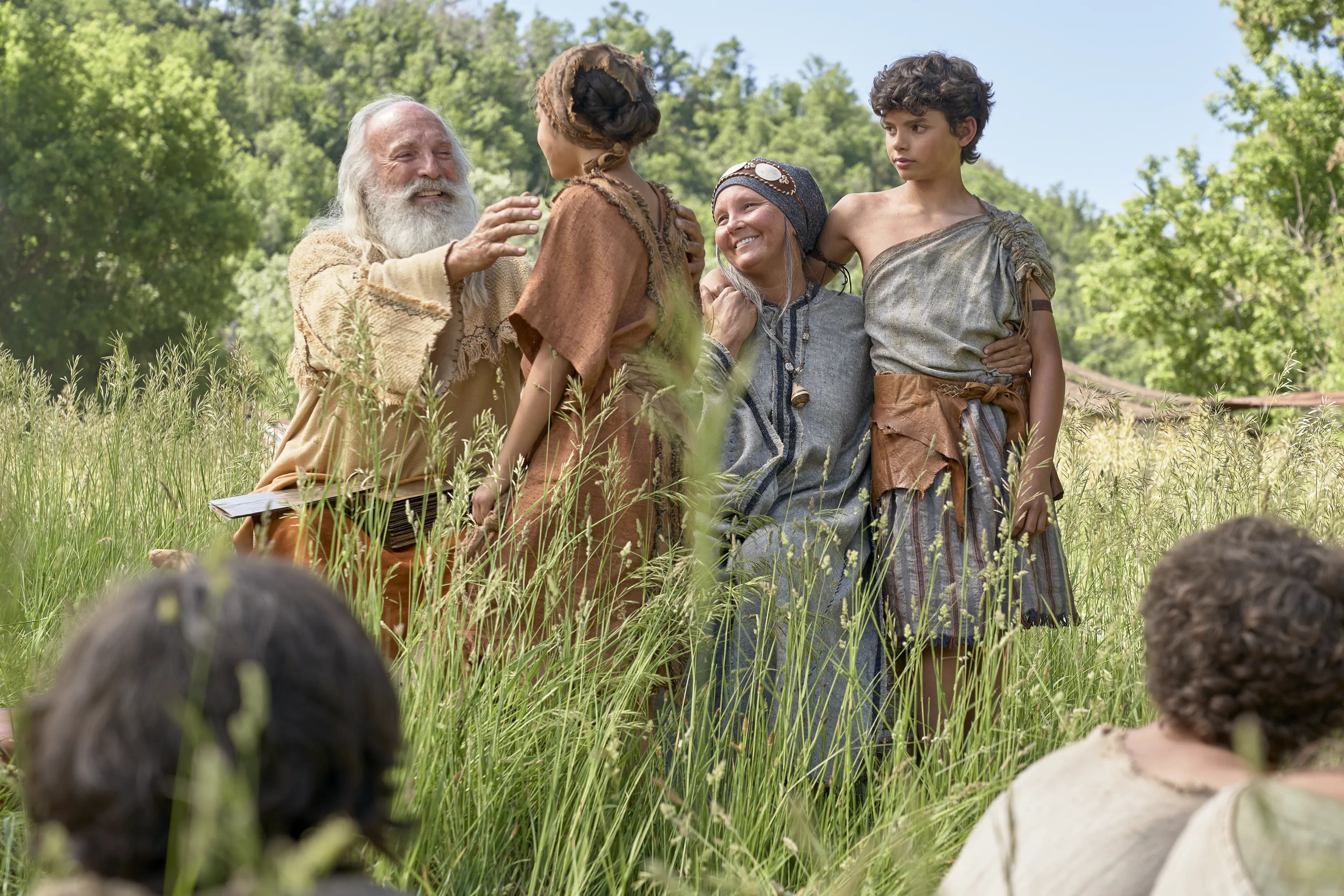 Lehi and Sariah teach their grandchildren.