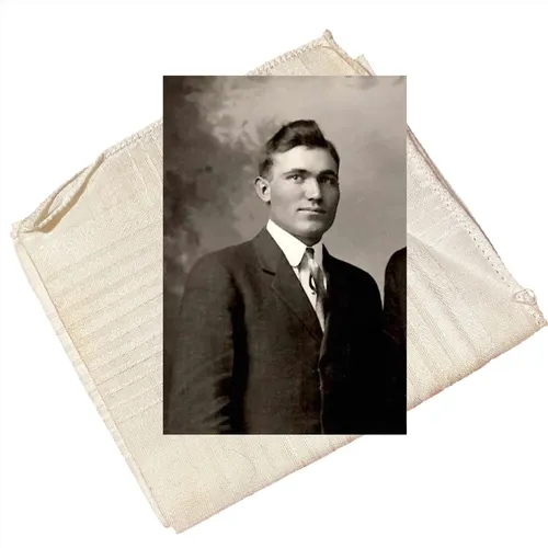 photograph of young man, with a handkerchief behind it