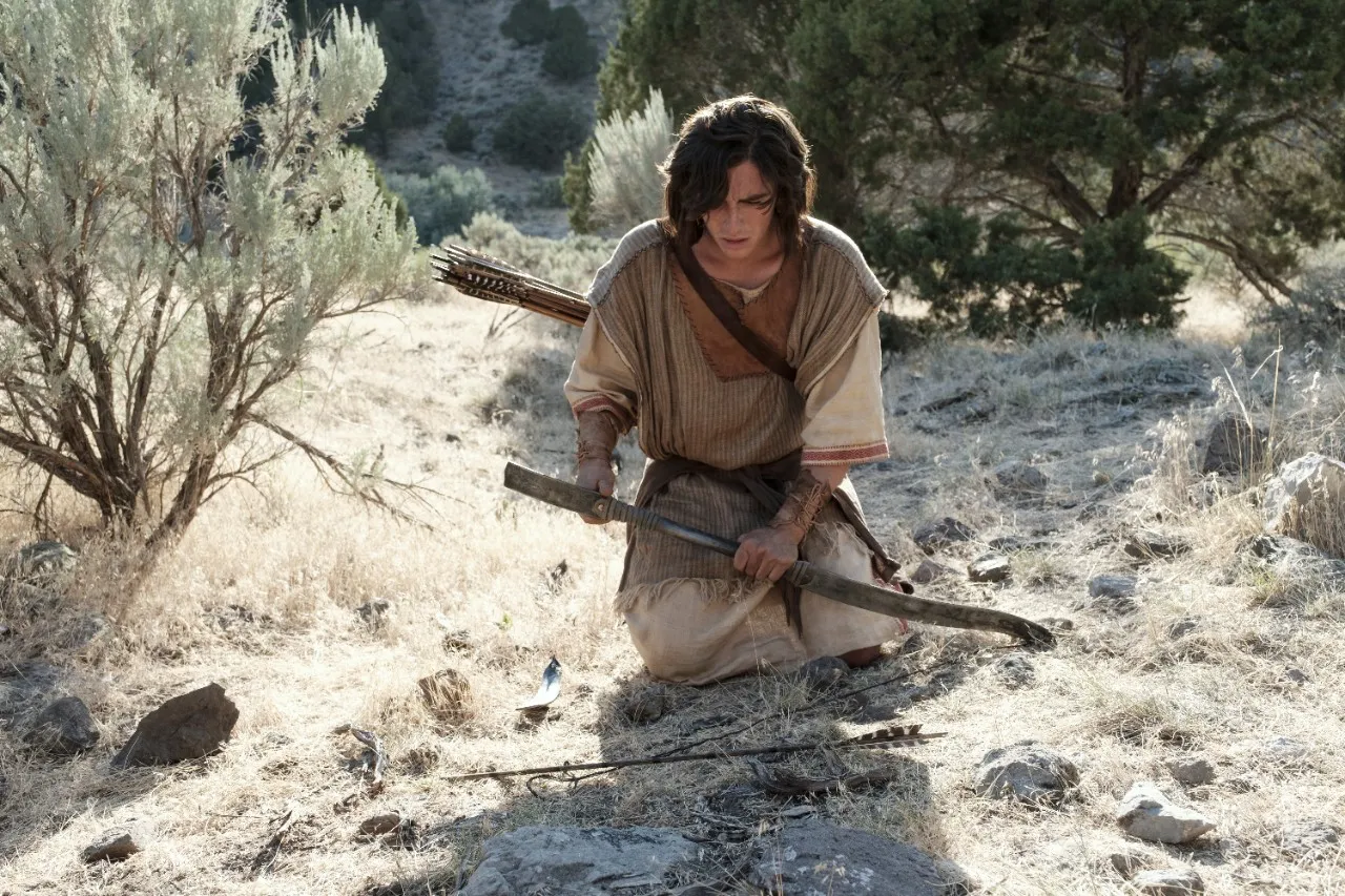 Nephi breaks his bow in the wilderness.