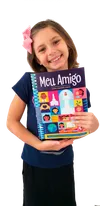 girl holding copy of Friend magazine in Portuguese