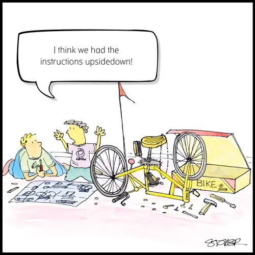 boys putting together a bicycle