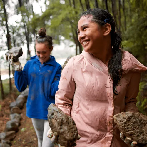 young women doing service