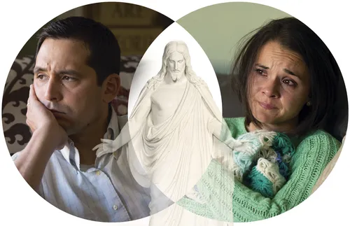 couple with Christus statue between them