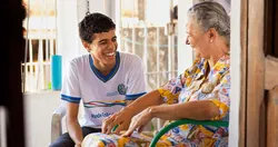 A young man visits his grandma