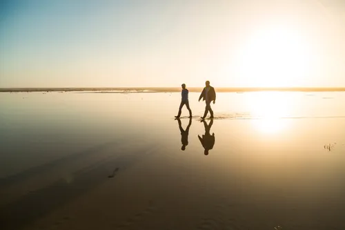 couple walking on beach