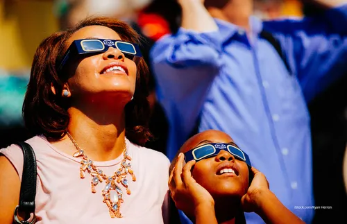 Crowd with eclipse glasses