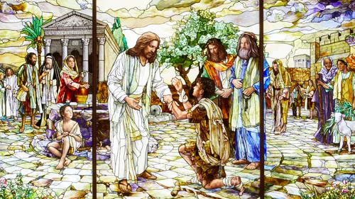 stained-glass depiction of people coming to the Savior, located in the Rome Italy Temple Visitors’ Center