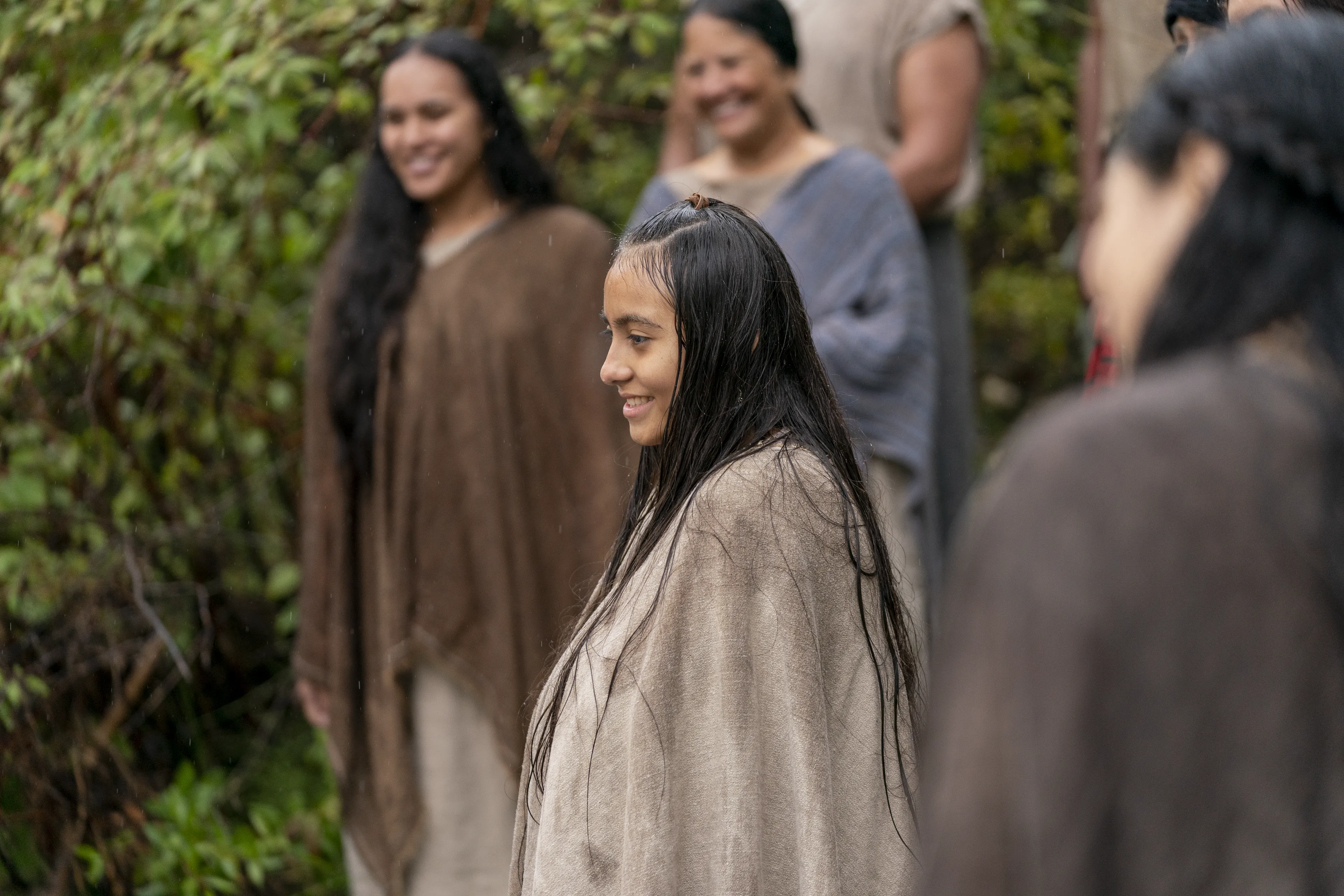 A group of people from the land of Zarahemla gather together to be baptized. They watch as Alma the Younger baptizes more of their friends and family.