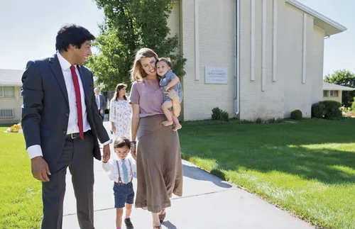 family walking outside a church