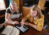 Girl accessing Church resources on tablet