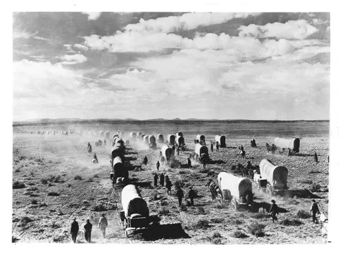 pioneers traveling by wagon
