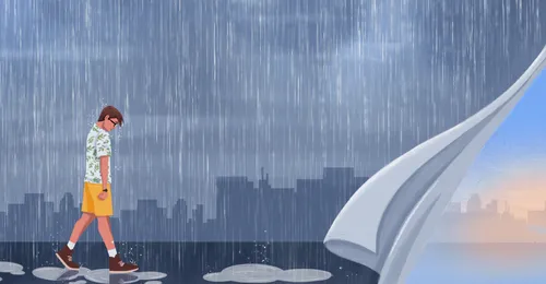 young man walking in the rain