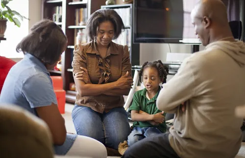 family praying together