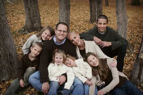 Portrait of a family in the woods.