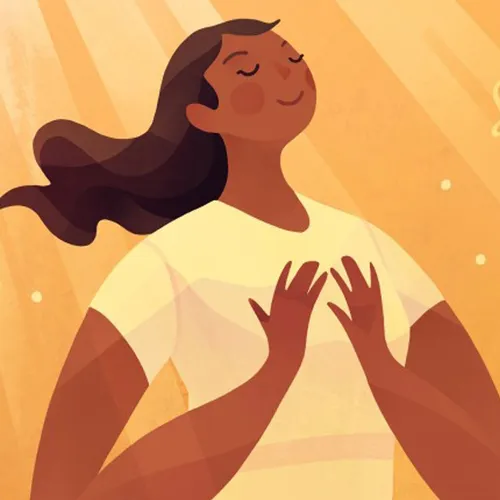 a woman standing and smiling