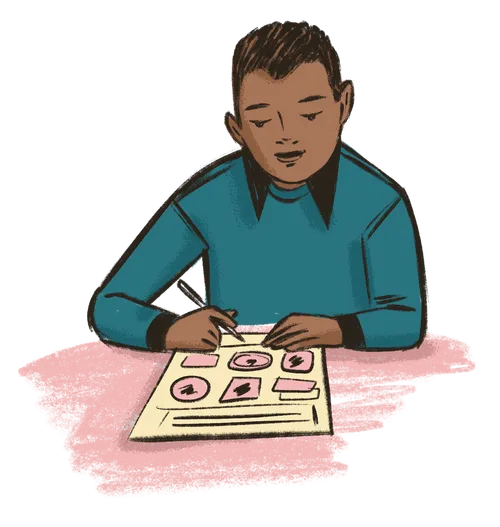 Boy writing on paper