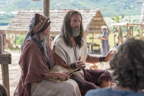 Nephi and his wife teach the people about baptism and the doctrine of Christ.