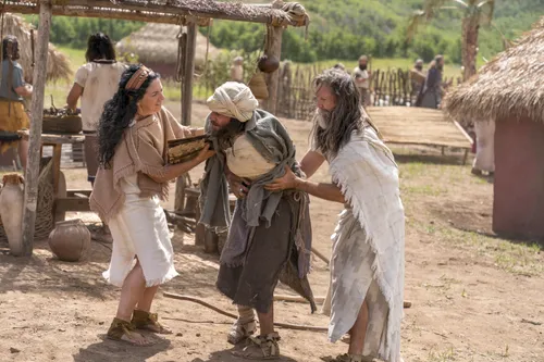 Jacob and his wife help a crippled man.